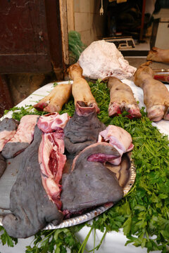 Tripe, hooves and meat  in a butcher shop