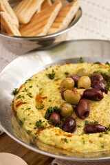 Delicious chickpea hummus with Kalamata olives