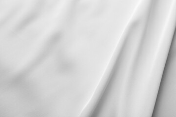 Texture of white silk ripple fabric as background, top view