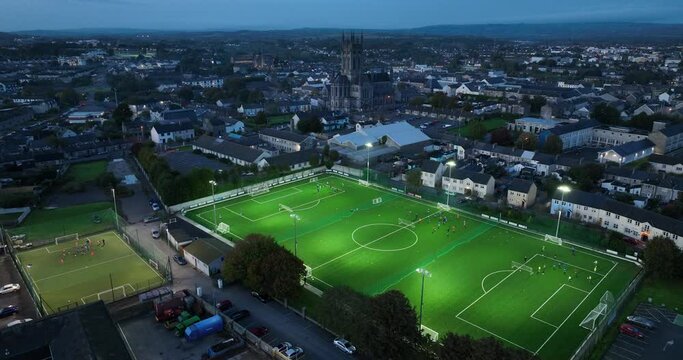 Aerial night view of the football field in 4k