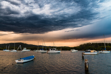 Sunset with storm clouds at the waterfront