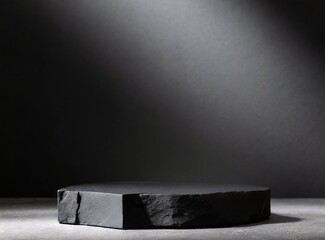 Stone rock podium with black background for product display.