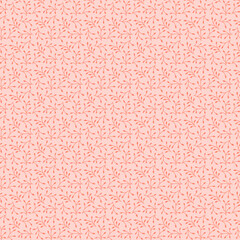 Cute modest botanical fabric pattern with simple leaves isolated on a peach pink background