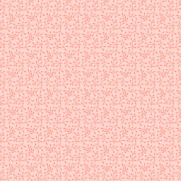 Cute modest botanical fabric pattern with simple leaves isolated on a peach pink background