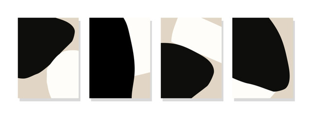 Mid century modern wall decor with abstract black and white shapes on a beige background.
