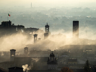 Bergamo, one of the most beautiful city in Italy. Amazing aerial landscape of the fog rises from...