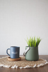 blue coffee cup with hello word