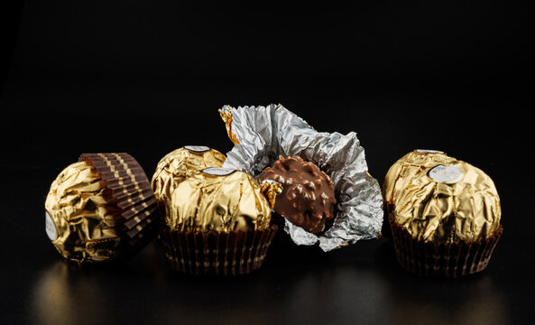 KRASNOYARSK, RUSSIA - December 06, 2023: Elite chocolate FERRERO ROCER on a black background.