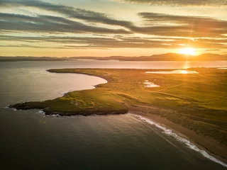 Zelfklevend Fotobehang Irelands West on Achill Island. Drone shot of the coast at sunset © Christian