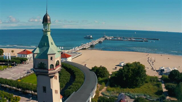 Aerial view of city center in Sopot, drone flying towards the pier at sunny summer day