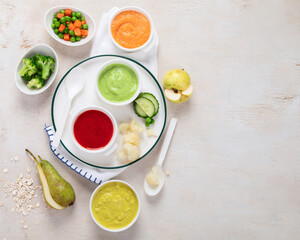 Baby food. Colorful vegetable and fruit puree.