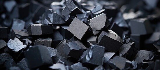 Closeup of ferrotitanium used for modifying, purifying and enhancing steels and alloys. - obrazy, fototapety, plakaty
