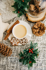 Morning coffee in a cup. Christmas composition. Cup of coffee, anise star, christmas cookies. top view