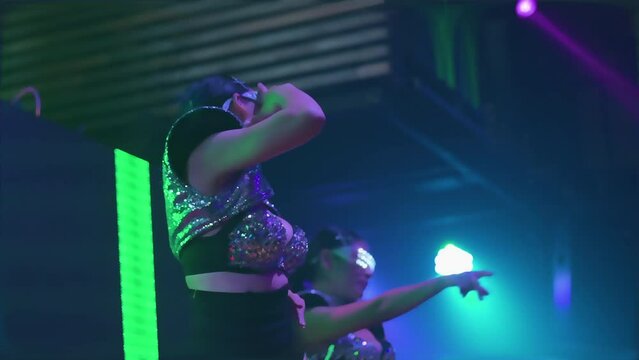 Fashion lacer dancer show performance on stage. Nightlife and disco dance party concept. Fun music festival
