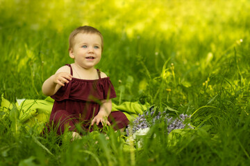 The soft focus on a toddler against a sunlit field creates an aura of enchantment. The image is a...