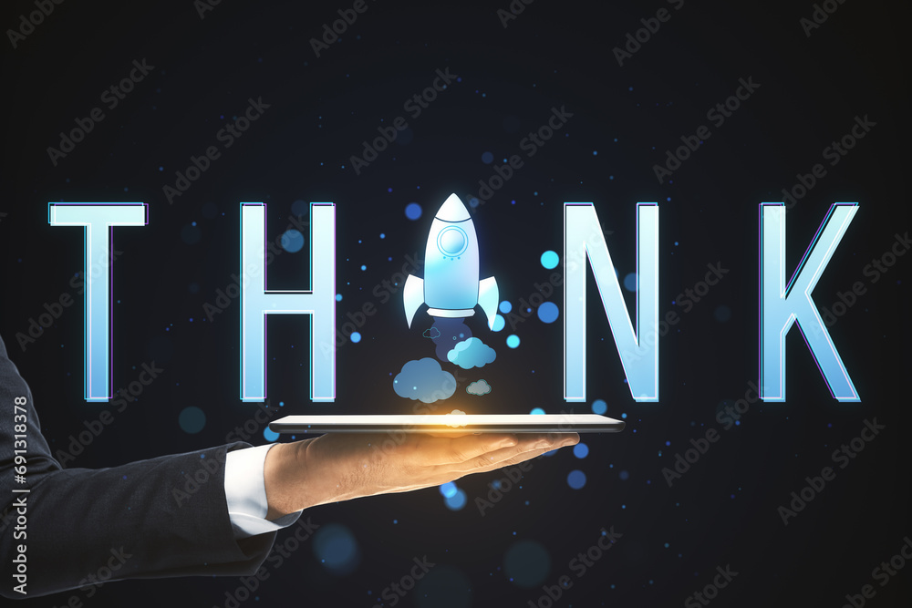 Poster close up of businessman hand holding tablet with creative text with space ship replacing letter on b