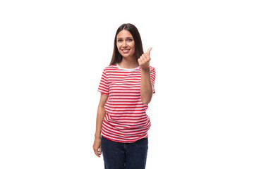 Obraz na płótnie Canvas young pretty smiling european woman with straight black hair is wearing a striped red t-shirt