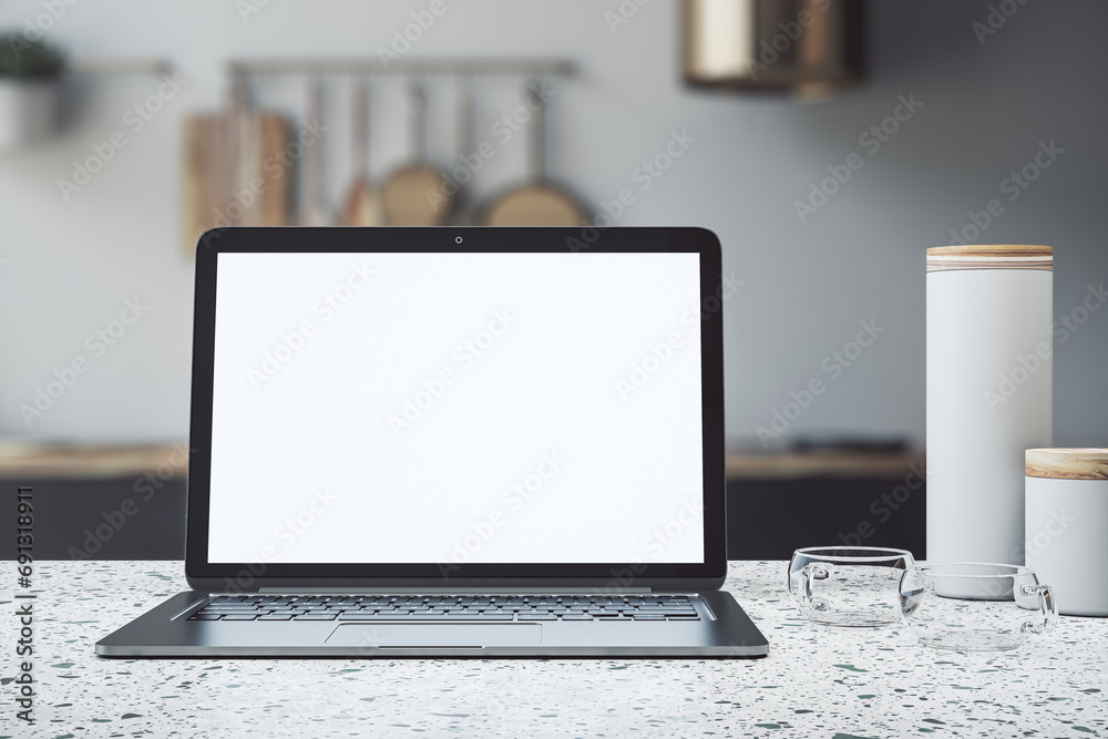 Poster modern laptop with blank screen on kitchen counter for mockup. 3d rendering
