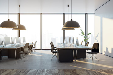 Contemporary coworking office interior with panoramic windows and city view, furniture and lamps. 3D Rendering.