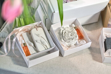 The aromatherapy stone, designed to naturally diffuse scents, alongside a fragrance bottle,...