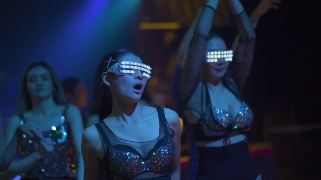 slow motion VDO. Fashion lacer dancer show performance on stage. Nightlife and disco dance party concept. Fun music festival