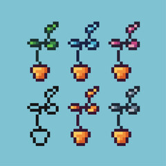 Fototapeta premium Pixel art sets of plant icon with variation color item asset.plant flower icon on pixelated style. 8bits perfect for game asset or design asset element for your game design asset