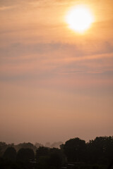 Sunset over a field  in country