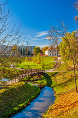 Picturesque Cityscape of Old city Grodno In Autumn Morning With Old Houses and River Embankment In background At Sunny Sky.