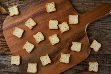 Fototapeta premium Bruschetta breads in flat lay on wooden board