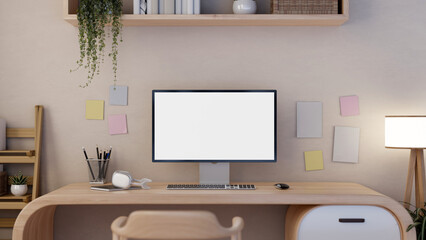 Front view of a white-screen desktop PC computer mockup on a modern wooden desk in a minimalist room