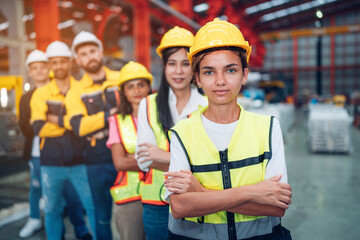 Team and portrait of engineering employees standing in an industrial manufacturing factory. , Working together, Coordination and Teamwork concept.
