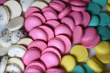 Lots of colorful macaroons. Bright background