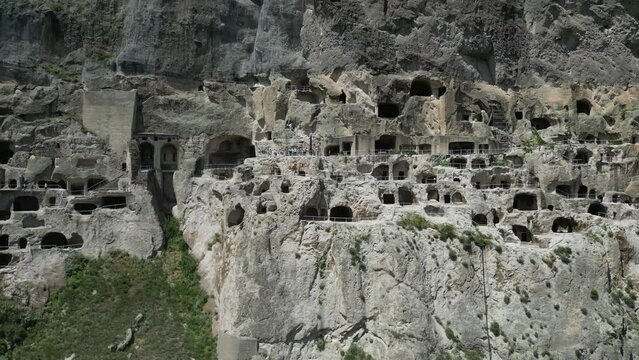 4K Aerial view of the rock-cut caves of the medieval monastery Vardzia