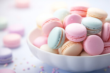 Obraz premium Colorful Closeup French macarons on dish with blurred background and beads Variety of Pastel color. Sweet and dessert, Colorful french desserts banner with copyspace. 