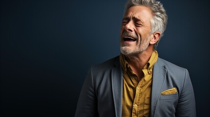 Obraz premium Studio shot of a senior man experiencing chest discomfort against