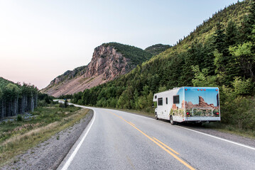 Camper RV truck parked Cape Breton Island Coast highway road scenic Cabot Trail route Nova Scotia Highlands Canada