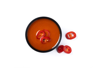 Spicy chili sauce in a bowl isolated on white background