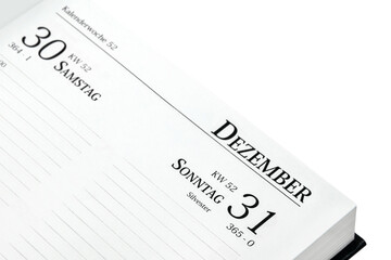 German calendar book 2023 December 31  Sunday New Years Eve and Saturday Week isolated on white...