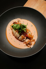 Baked squid stuffed with vegetables and sauce. Stuffed calamari