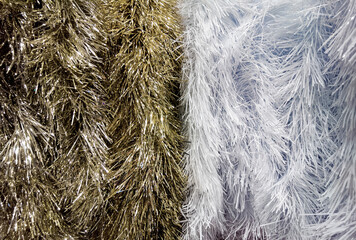 Festive background in a variety of white and gold garlands