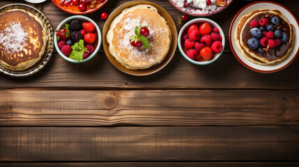 Pancakes with berries and maple syrup