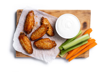 Buffalo spicy chicken wings with cayenne pepper sauce isolated on white background. Top view