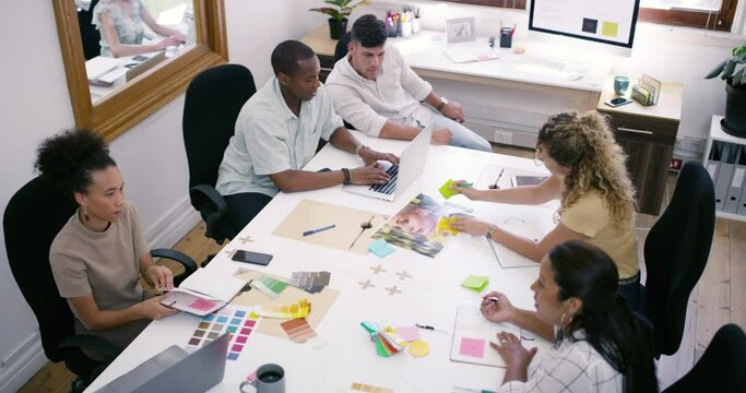 Creative people, planning and meeting in design for teamwork, collaboration or strategy at office. Diversity or group of employees working together on project, plan or startup above at workplace