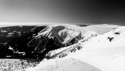 Fototapeta na wymiar Nice panorama of winter mountain landscape from the mountain ridge