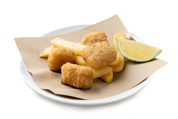 Traditional fish and chips with a slice of lemon, isolated on white background