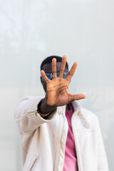 Closeup of african man hand making stop sign