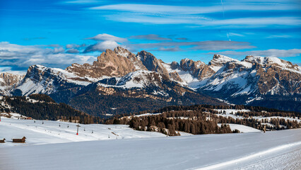 The largest high altitude plateau in Europe in winter. Snow and winter atmosphere on the Alpe di Siusi. Dolomites.