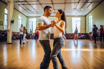 Couple in the dancing class. Learning how to dance for wedding dance, for their first dance,...