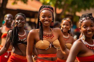 Gordijnen Cultural tribe dancers. Young african woman dancing in local music festival. Traditional dances in Africa. © VisualProduction