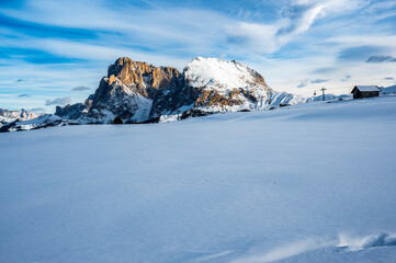 The largest high altitude plateau in Europe in winter. Snow and winter atmosphere on the Alpe di Siusi. Dolomites.